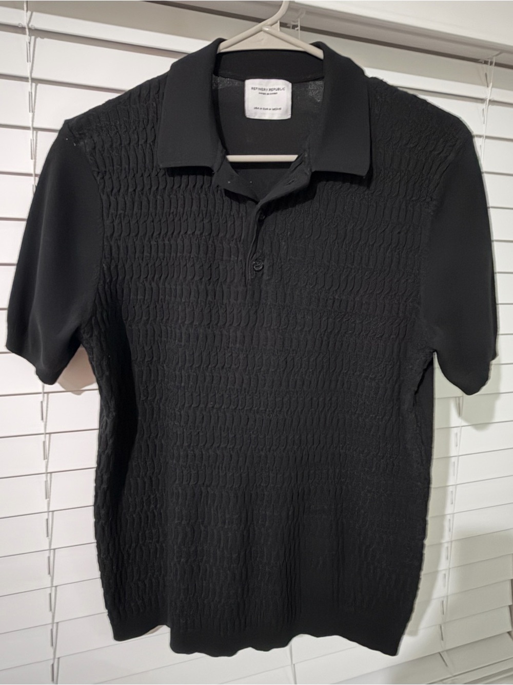 Refinery Republic  short-sleeve polo in black with a textured front panel